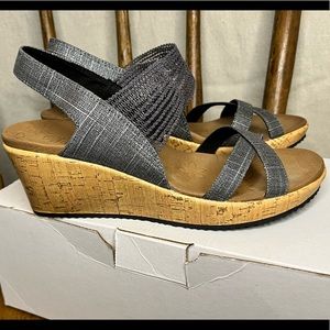 Sketchers size 9, women’s cork wedge slip on.